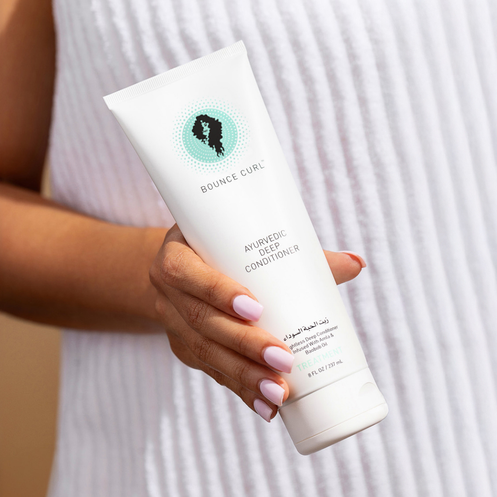 Bounce Curl Ayurvedic Deep Conditioner - styled product lifestyle shot